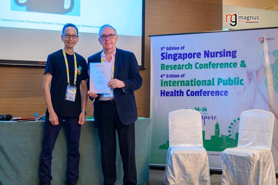 Garry Goh felicitated by David John Wortley